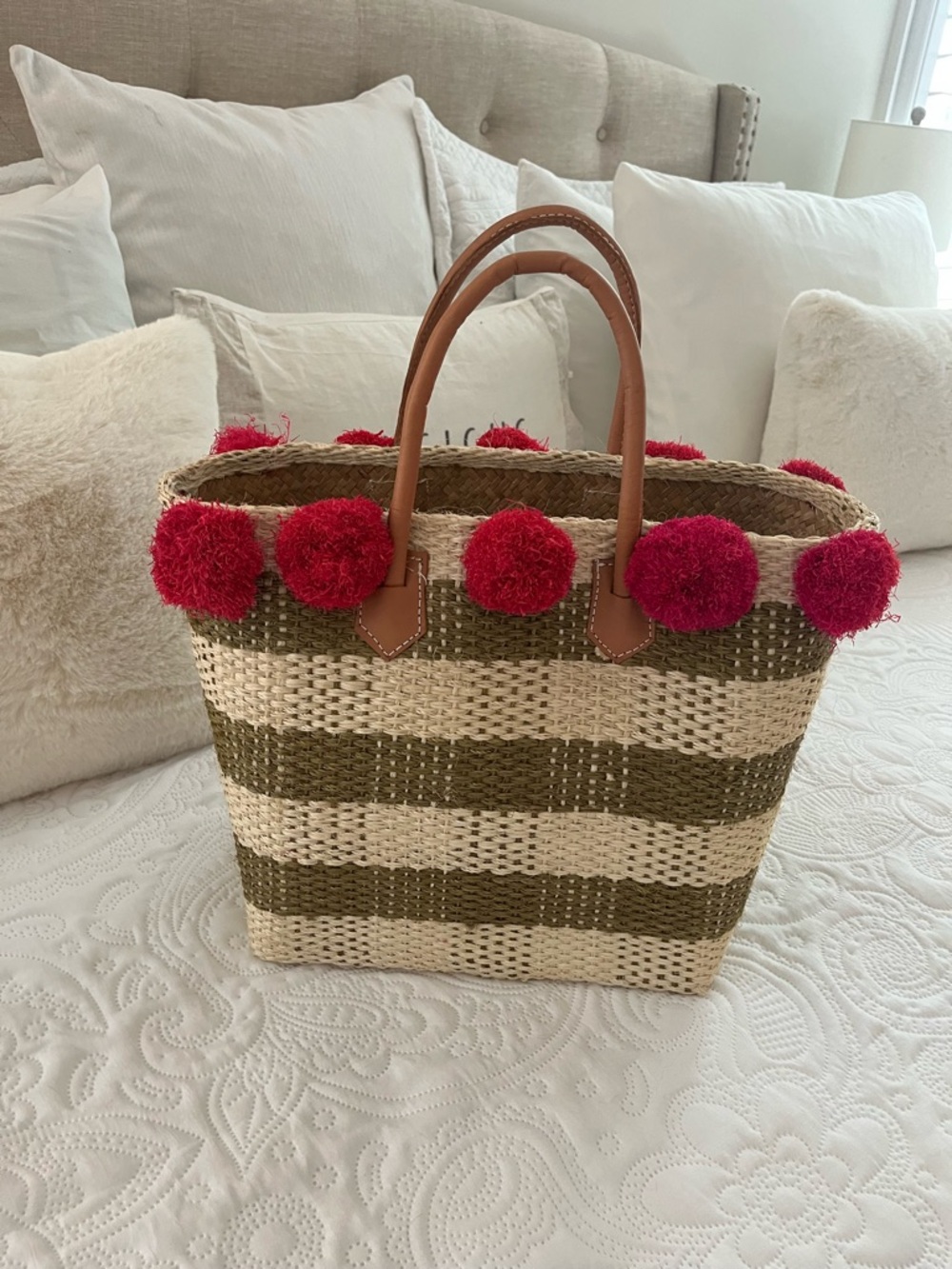 crown & ivy Olive and Natural Woven Tote with Hot Pink Pom Accents
